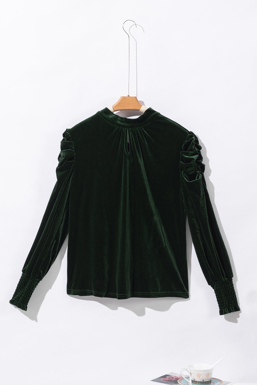 Blackish green velvet puff sleeve mock neck blouse by Carmine Juneberry, featuring a stylish design and elegant fabric details.