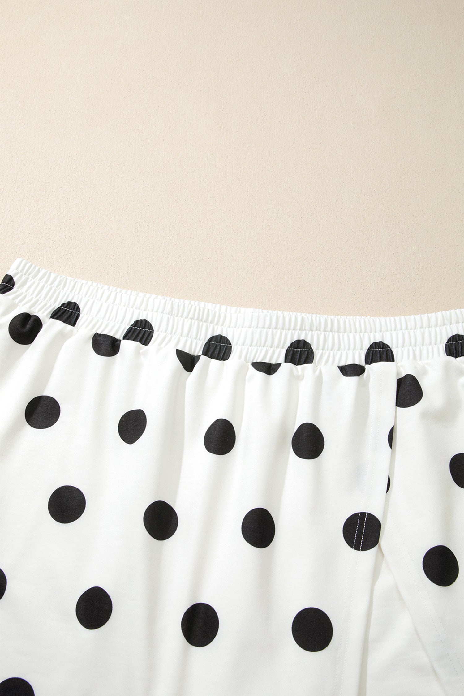 Plus size polka dot tank top and split skort set for women by Byzantium Bay, featuring a stylish polka dot pattern and comfortable fit.