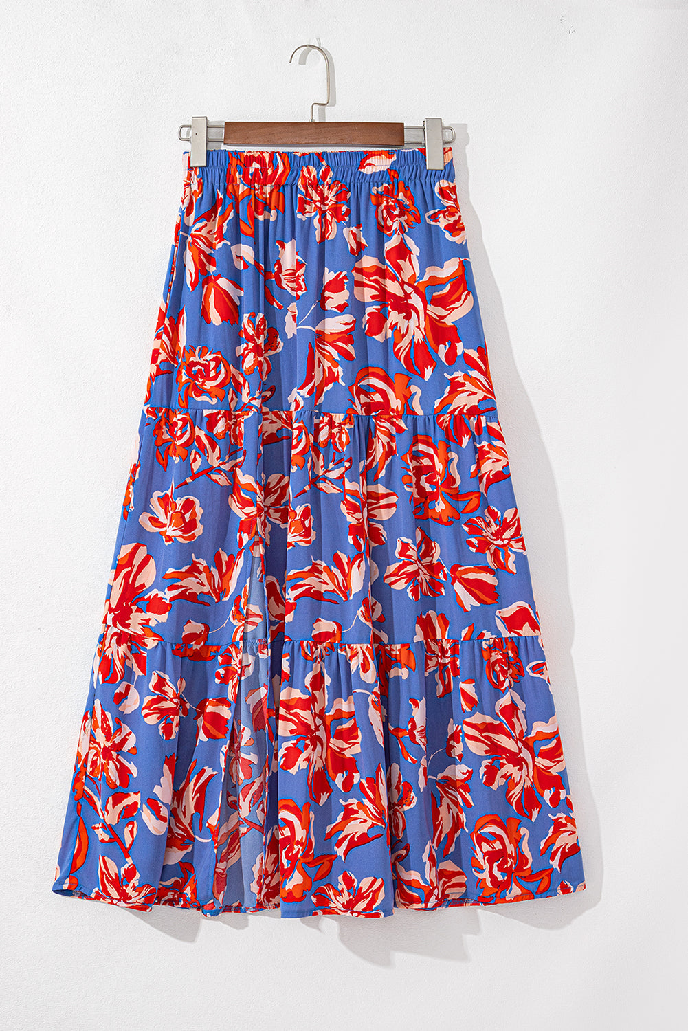 Byzantium Bay boho floral tiered maxi skirt with side slit, flowing fabric, and vibrant floral pattern for women&