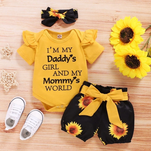 SunnyBloom™ baby girl sunflower outfit from Carmine Juneberry, featuring a cute sunhat, sunflower dress, and matching bloomers.
