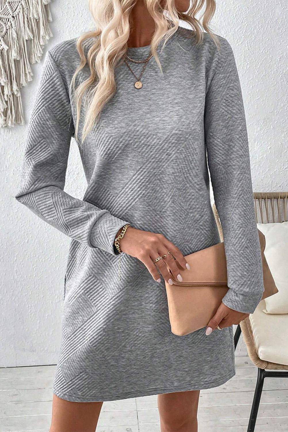 Gray solid color textured long sleeve shift dress by Carmine Juneberry, showcasing a stylish, comfortable design.