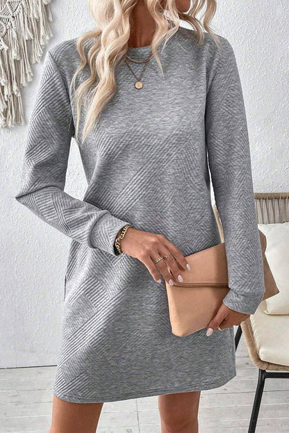 Gray solid color textured long sleeve shift dress by Carmine Juneberry, showcasing a stylish, comfortable design.