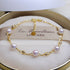 18k Gold Seawater Pearl adjustable double-layer bracelet by Carmine Juneberry, featuring elegant pearls and delicate design.