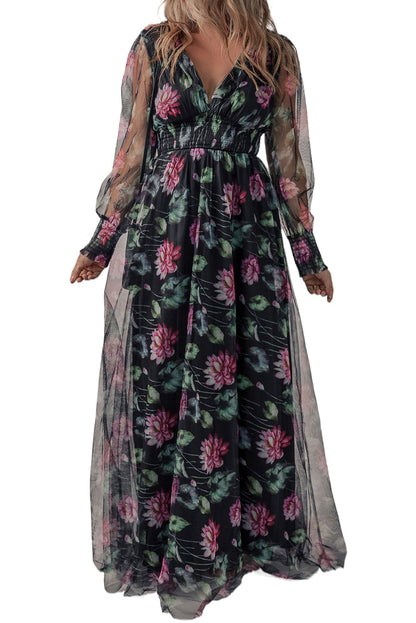 Black mesh sheer floral maxi dress with shirred high waist by Harlequin Daisy, featuring a flowing design and delicate floral details.