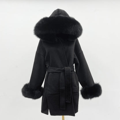 Carmine Juneberry oversized wool coat with double-sided fabric, hood, and plush fur collar, designed for luxurious warmth and style.