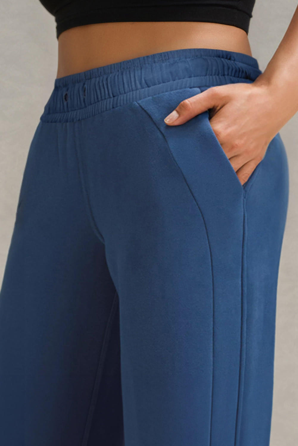 Carmine Juneberry sail blue high waist wide-leg sweatpants with drawstring and side pockets, made of comfortable fabric.