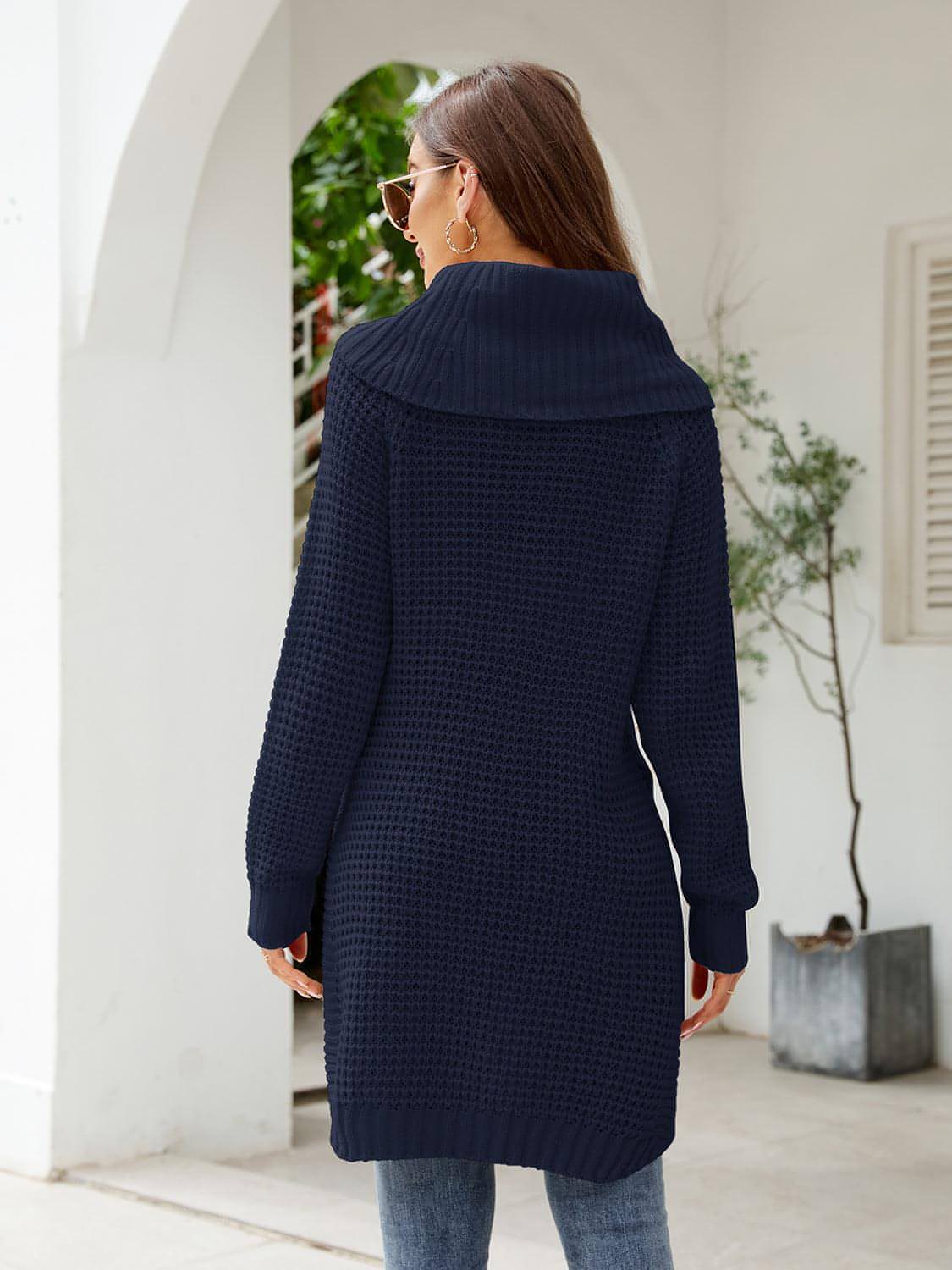 Carmine Juneberry waffle-knit turtleneck sweater dress with slit, featuring a cozy, textured fabric and a stylish, form-fitting silhouette.