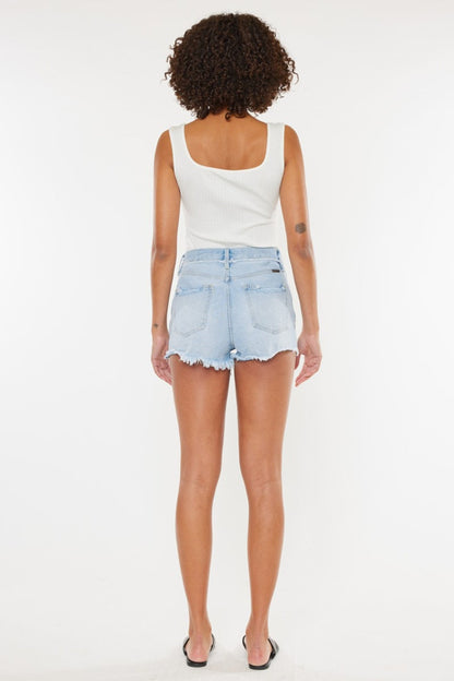 Distressed Kancan denim shorts with button fly, featuring a stylish automotive-inspired design by Jade Icarus.