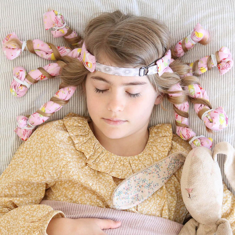 Maroon Asteria heatless hair curlers with curling rod ribbon headband, showing soft, curled hair and the fabric headband accessory.