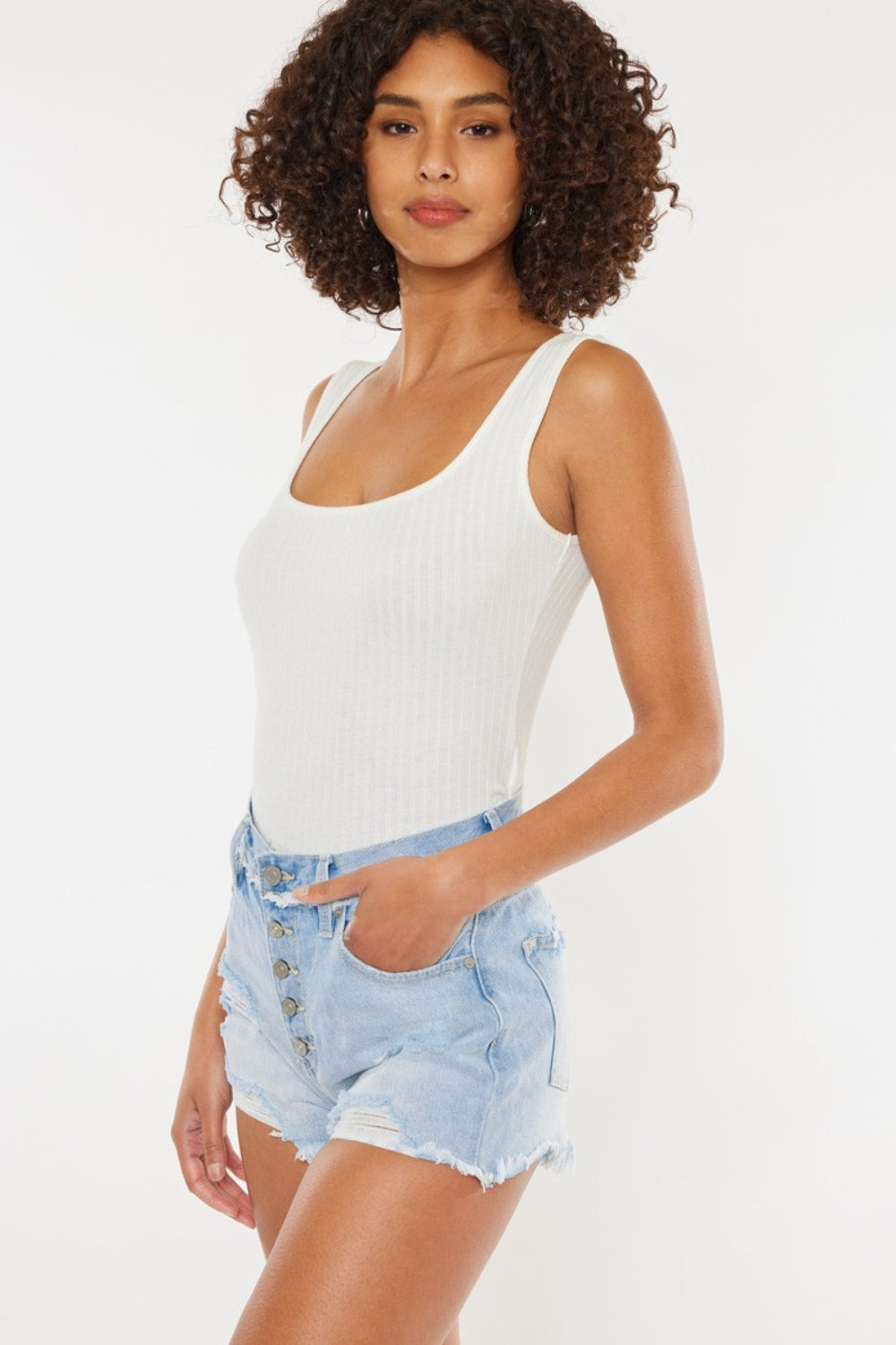 Jade Icarus Kancan distressed button fly denim shorts, showcasing ripped details and classic jean styling.