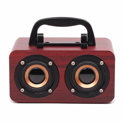 Maroon Asteria wooden wireless Bluetooth speaker for outdoor use, showing the compact portable design and natural wood finish.