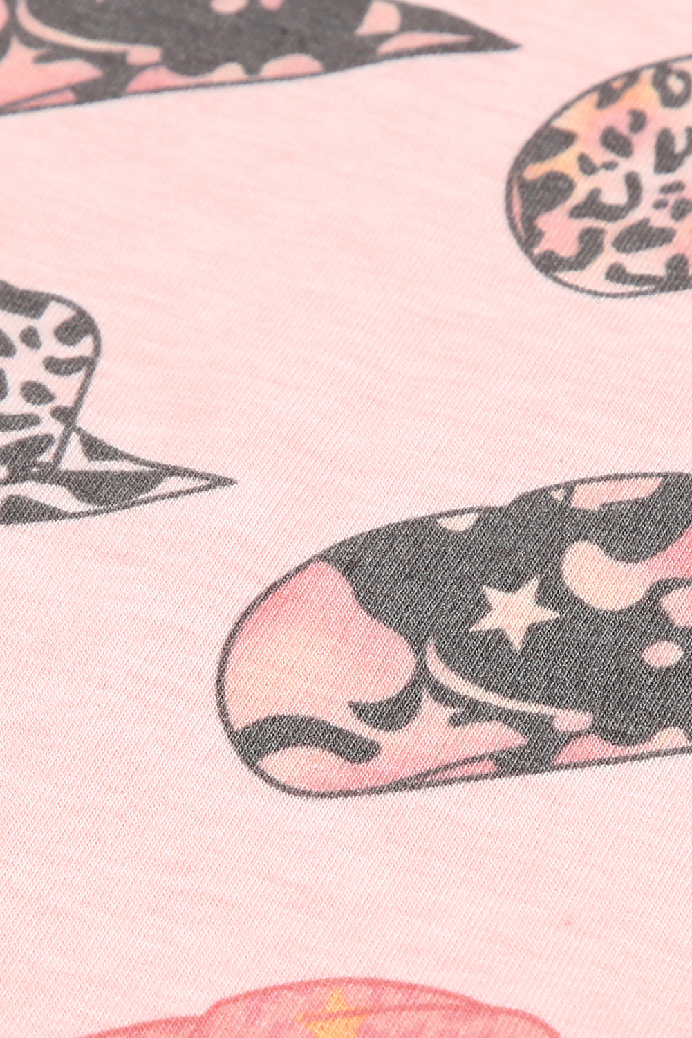 Pink leopard print short sleeve T-shirt and drawstring shorts set by Harlequin Daisy, featuring bold animal print and casual style.