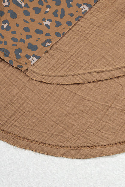 Brown printed raw edge leopard patchwork blouse by Carmine Juneberry, oversized top with bold animal print details.
