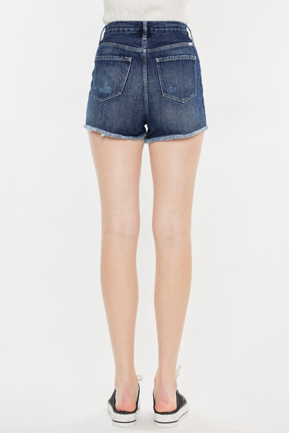 Jade Icarus Kancan Raw Hem Button Fly Denim Shorts for women, featuring distressed raw hem and classic button fly design.