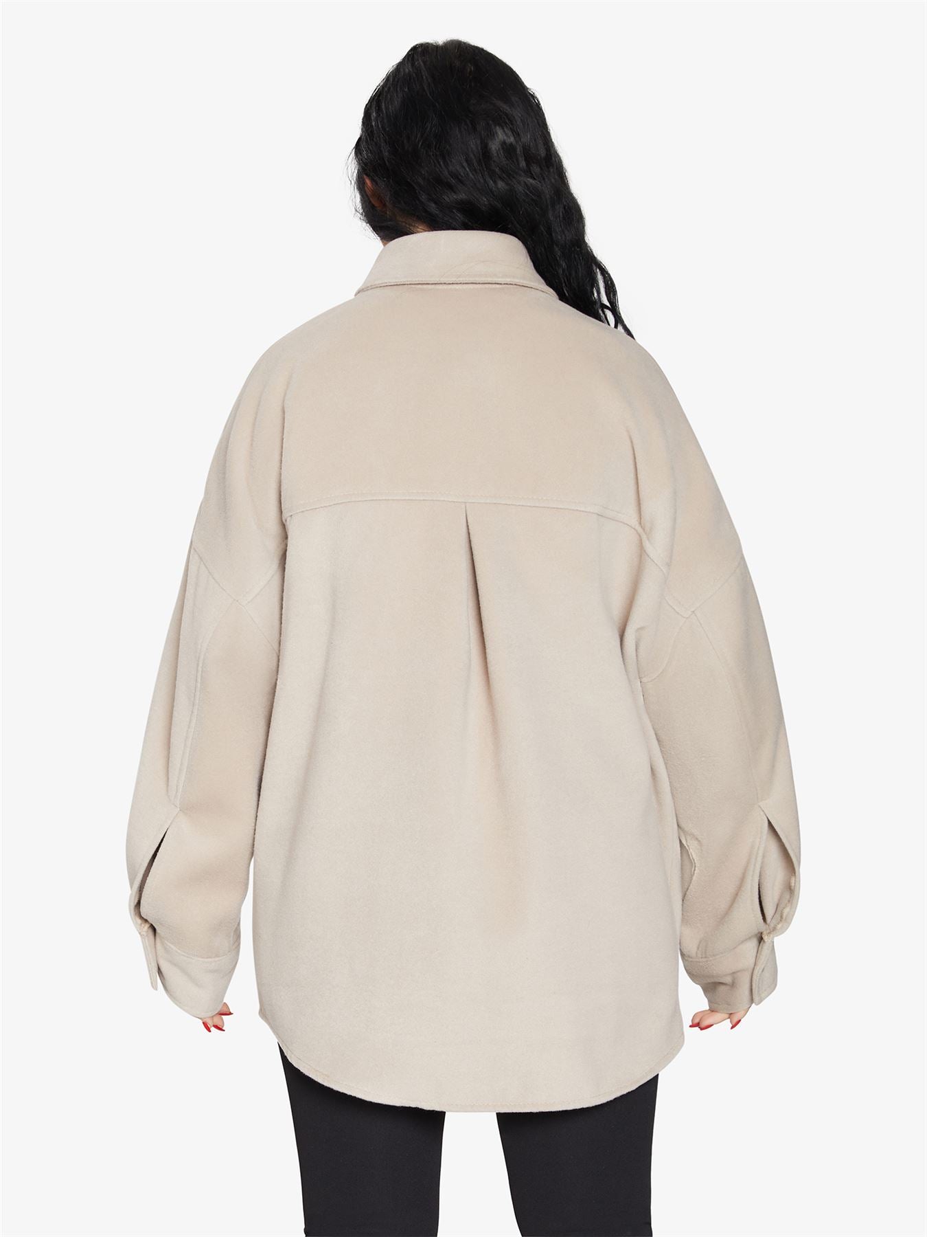 Rose Eleusis oversized patch pocket shacket, a stylish jacket with large patch pockets, shown on a model.