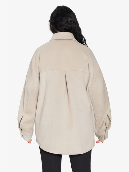 Rose Eleusis oversized patch pocket shacket, a stylish jacket with large patch pockets, shown on a model.