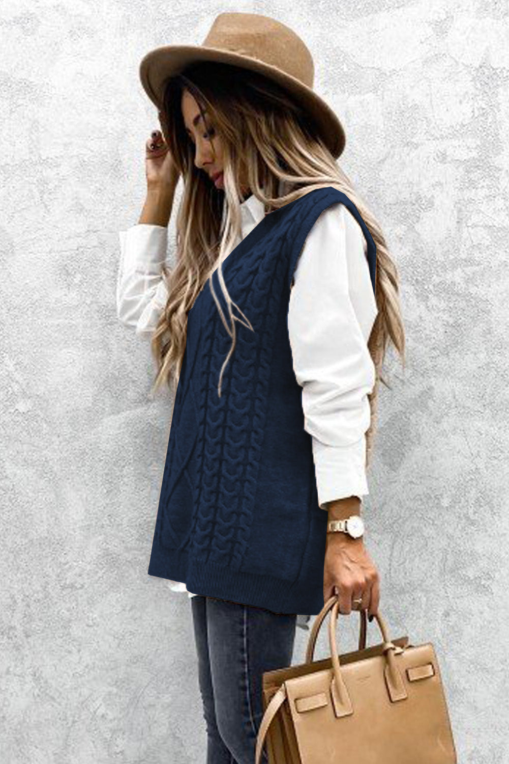 Blue sleeveless cable knitted sweater tank for women by Lavender Pallas, featuring a cozy, stylish knit design.