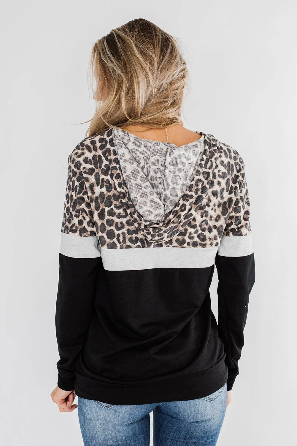 Women’s Into the Jungle color block hoodie by Jade, featuring vibrant jungle-inspired design and cozy fit.