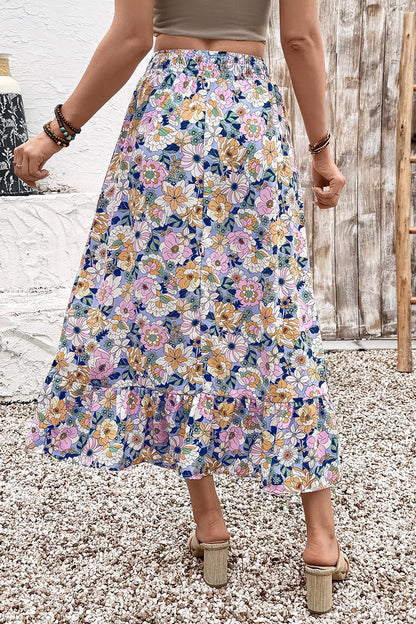 Floral lace-up high waist ruffle maxi skirt for women by Byzantium Bay, featuring a flowing design with floral patterns and ruffled hem.