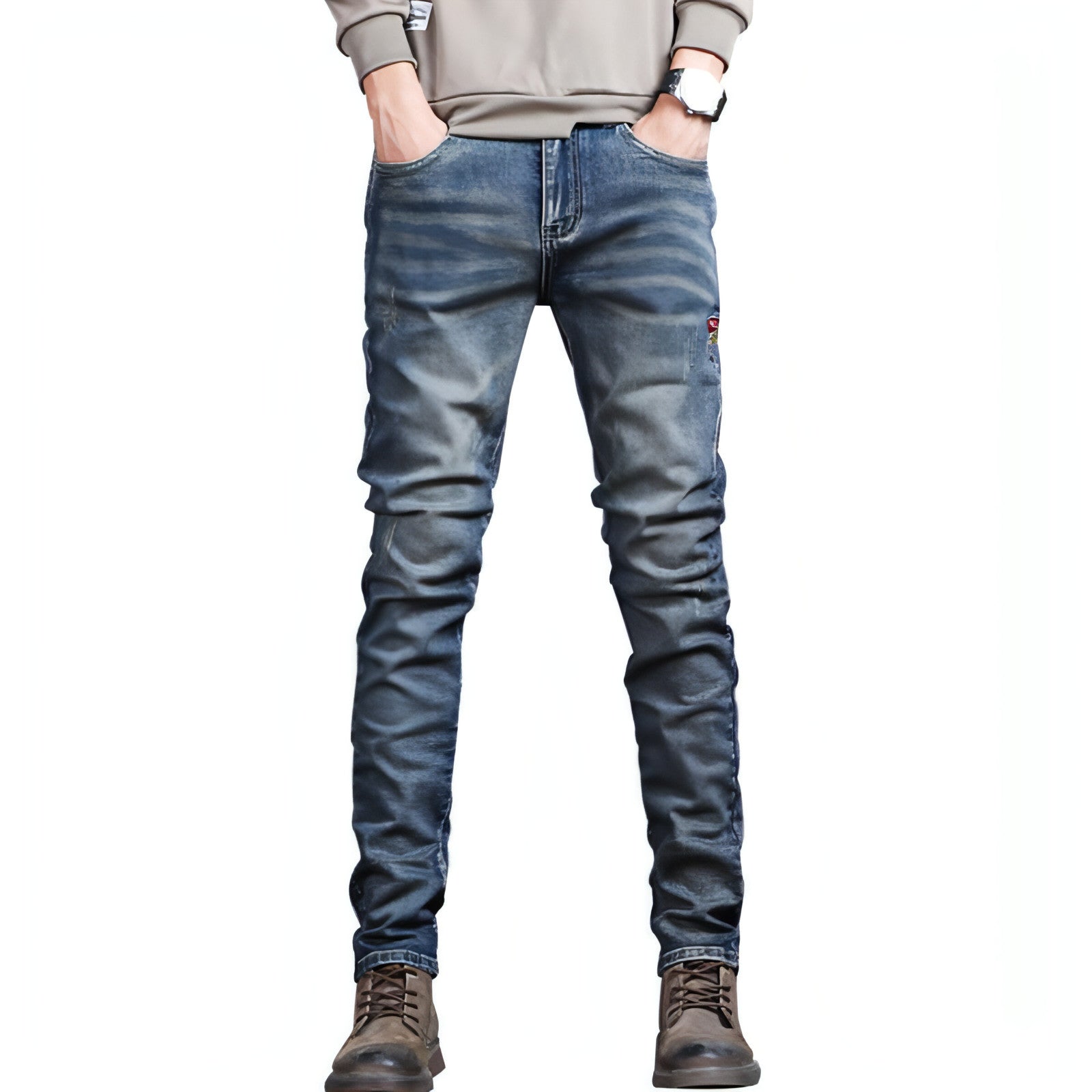 Youth retro embroidered denim pants for men by Carmine Juneberry, featuring classic blue denim with colorful embroidery details.