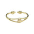 Ariel Bombshell Lotus cuff bracelet featuring intricate jewelry design with lotus motifs, crafted in metal for a bold statement look.
