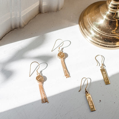 Ariel Bullet Tassel Earrings featuring vibrant tassels and bullet-shaped accents, stylish jewelry for casual or formal wear.