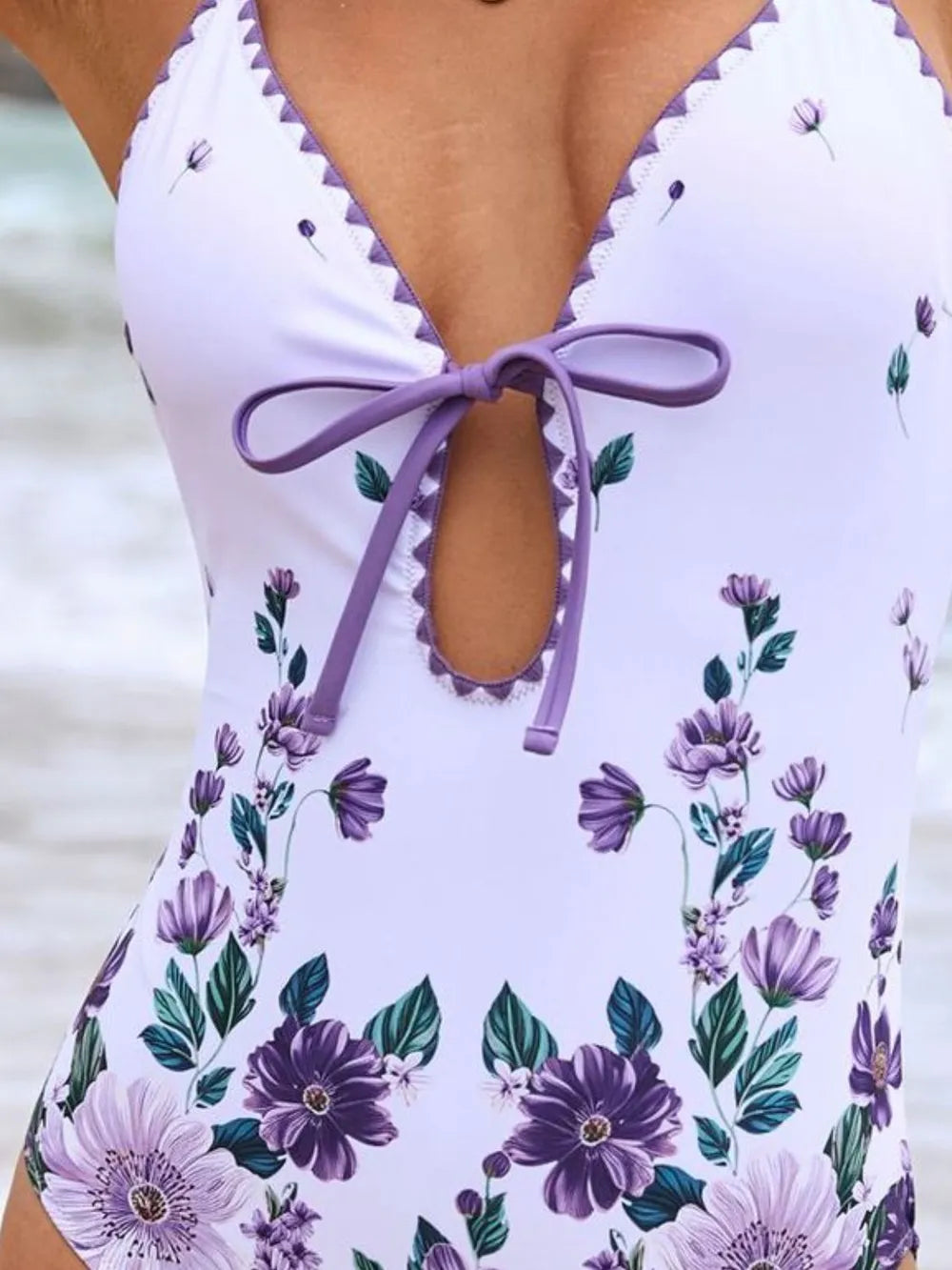 Printed spaghetti strap one-piece cover-up swim set by Jade Iapetus, featuring a stylish design and lightweight fabric for beachwear.