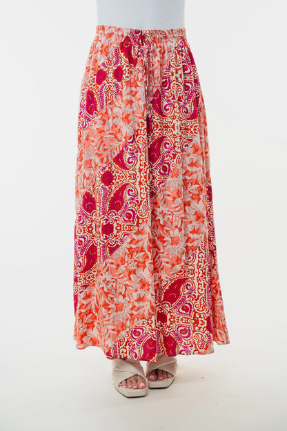 White Birch high-waisted floral woven skirt by Jade Icarus, featuring a full-length design with intricate floral patterns.