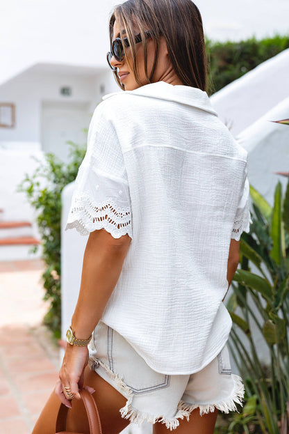 White crinkled lace splicing blouse with V-neck and collar, by Carmine Juneberry, featuring elegant sleeve details and a stylish design.