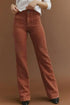 Brown high waist corduroy pants with square pockets from Carmine Juneberry, showcasing the textured fabric and stylish fit.