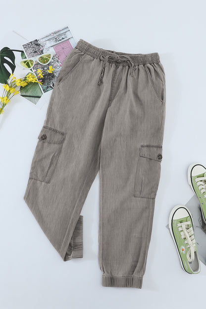 Gray drawstring cargo pocketed joggers for women from Lavender Pallas, featuring a relaxed fit and functional pockets.