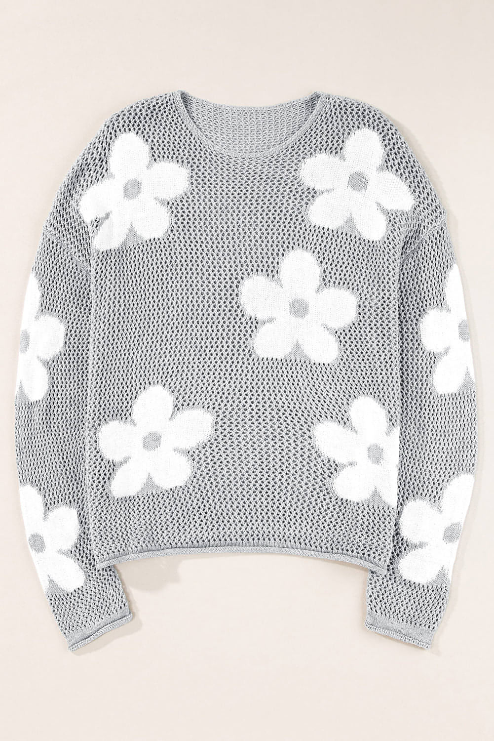 Light grey Carmine Juneberry sweater with big flower hollowed knit design, featuring a drop shoulder style.