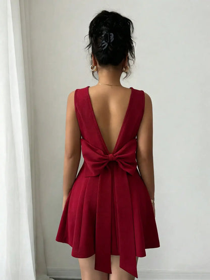 Burgundy European-style V-neck backless fitted dress with bowknot waist, elegant luxury apparel by Start2Finish.