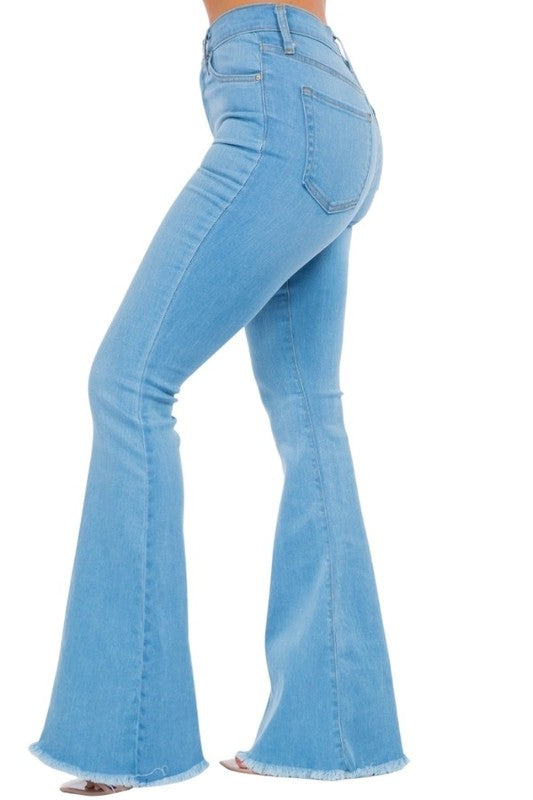 Light wash Jade Icarus bell bottom jeans with 34-inch inseam, showcasing fitted waist and flared leg style.