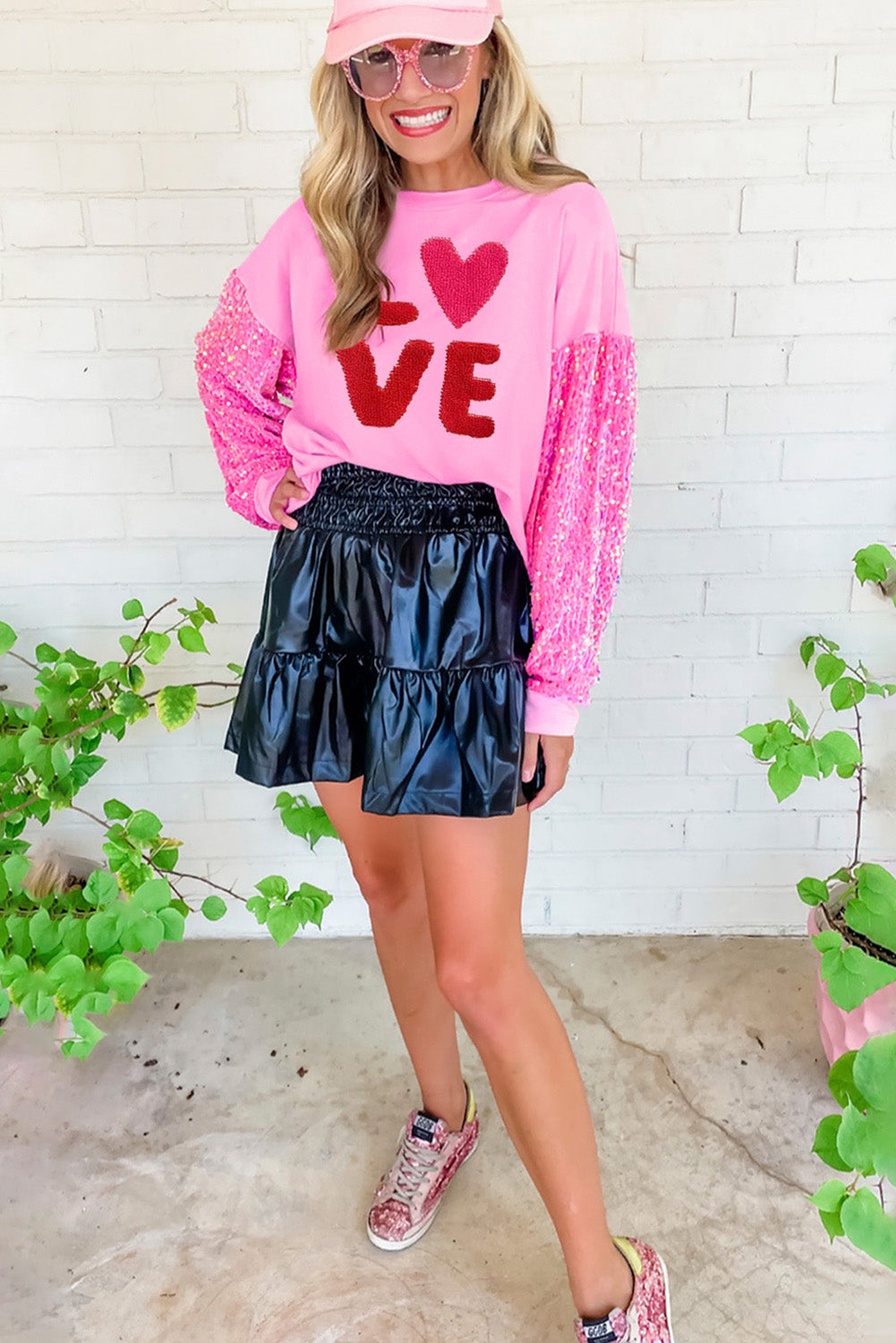 Pink Valentines LOVE chenille embroidered sequin sleeve sweatshirt by Harlequin Daisy, featuring soft fabric and decorative love lettering.
