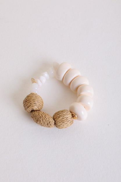 Ivory chunky beaded bracelet from Periwinkle Aether, stylish accessories with large round beads and a trendy design.