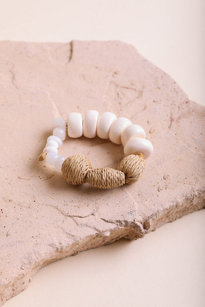 Ivory chunky beaded bracelet from Periwinkle Aether, stylish accessories with large round beads and a trendy design.