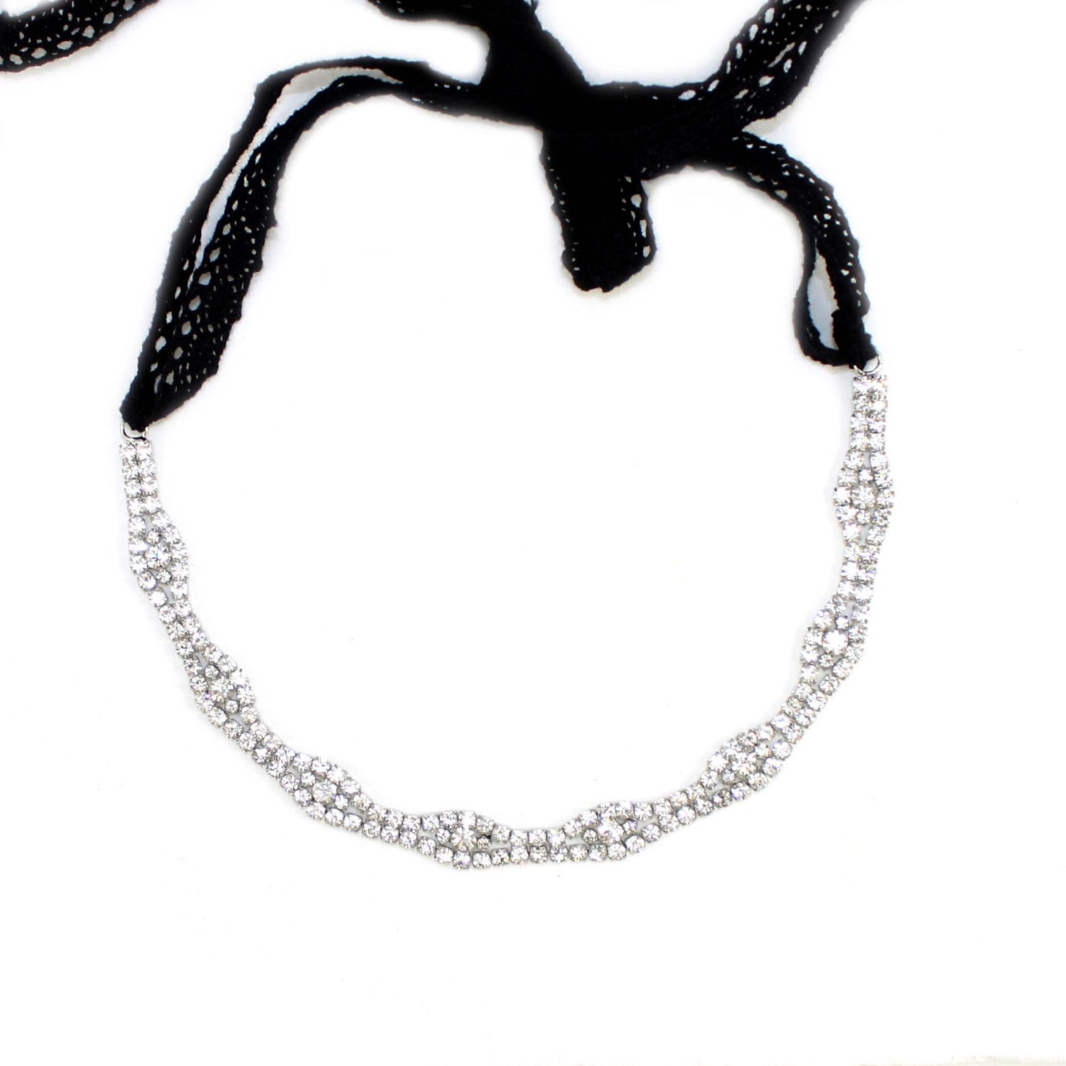 Cyan Ismene classic crystal hairband with clear embellishments, stylish accessory for hair styling and haircare.