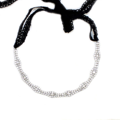 Cyan Ismene classic crystal hairband with clear embellishments, stylish accessory for hair styling and haircare.
