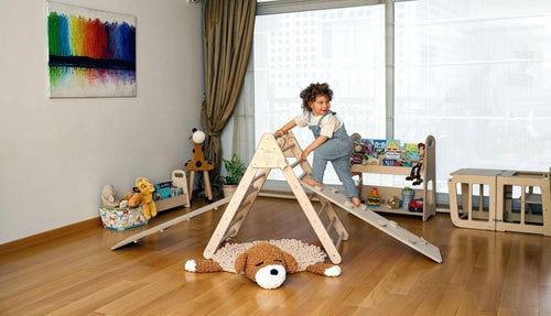 Red Oceanus foldable climbing triangle with ramp for kids, featuring sturdy wooden construction and a playful, versatile design.