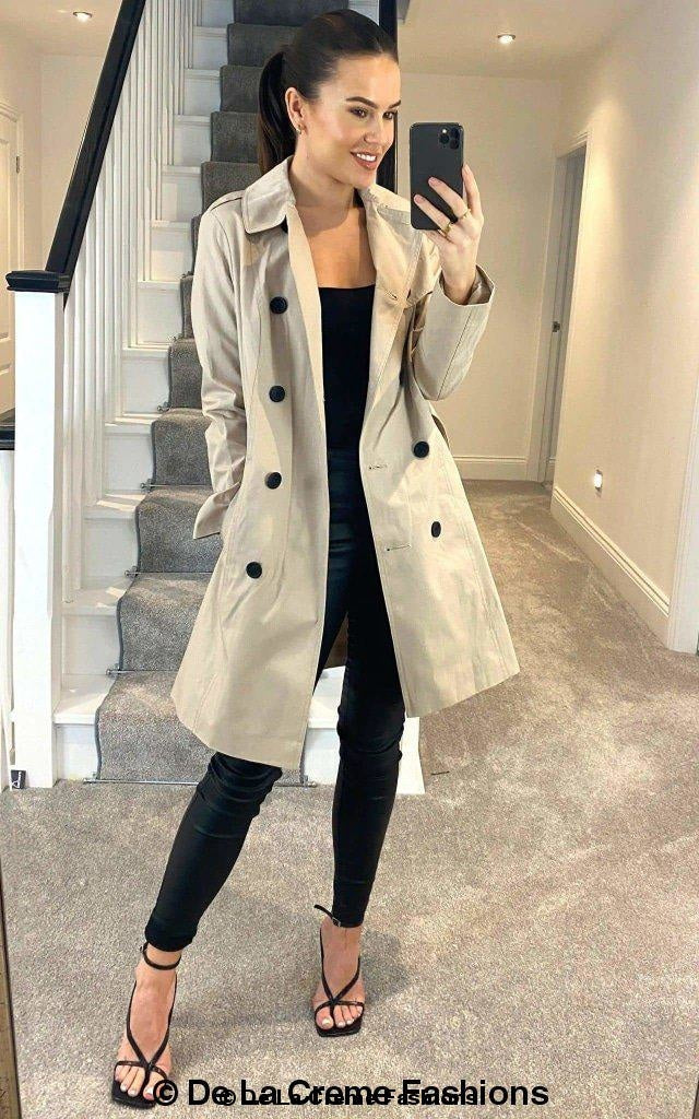 Rose Eleusis cotton blend belted trench coat worn by a model, showcasing classic collar, waist belt, and long sleeves.