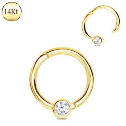 14K yellow gold jeweled seamless clicker ring from Peridot, featuring sparkling gemstones and a smooth, polished finish.