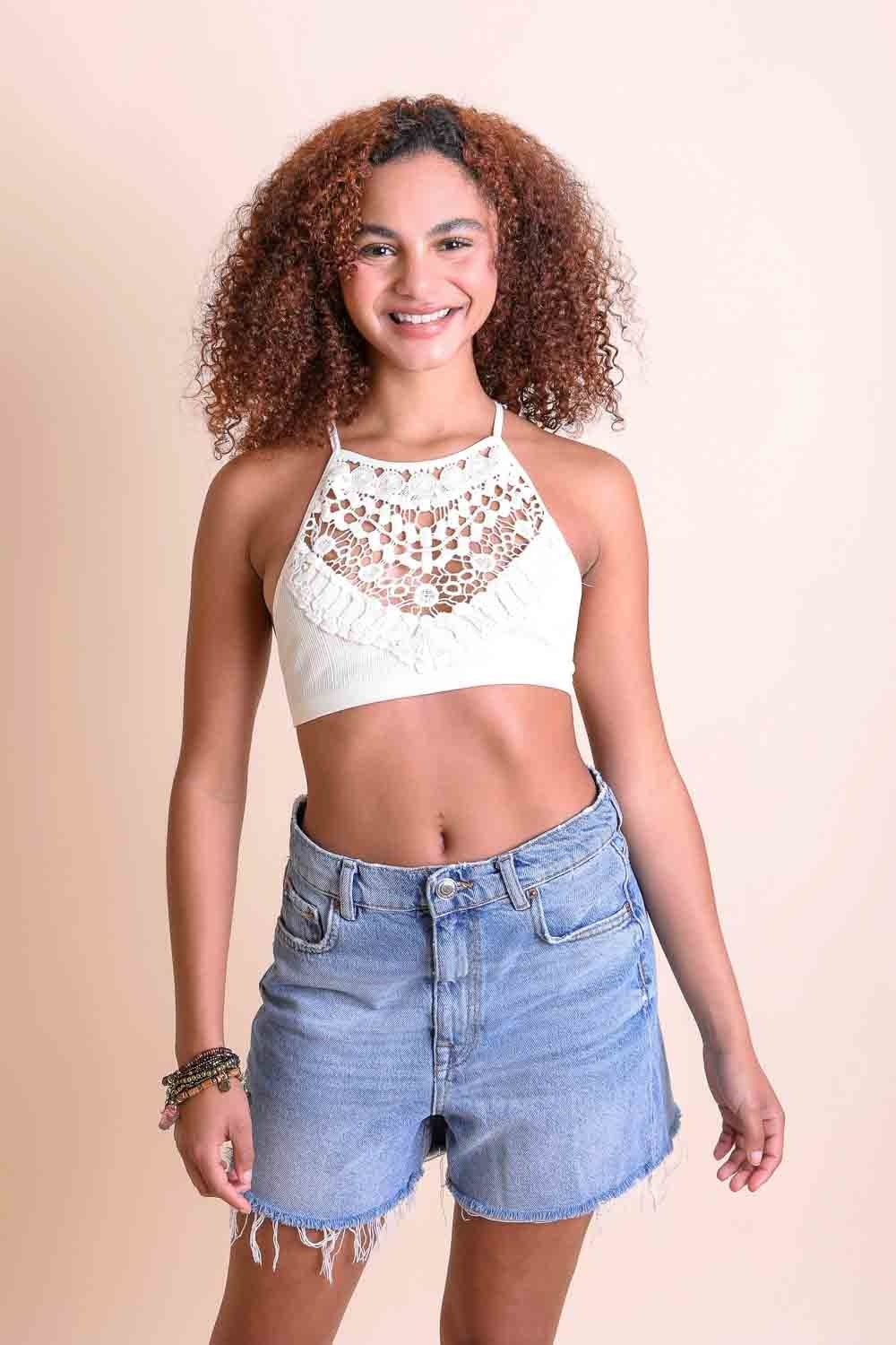 Ivory crochet lace high-neck bralette with halter style and cross-back design from Periwinkle Aether lingerie collection.