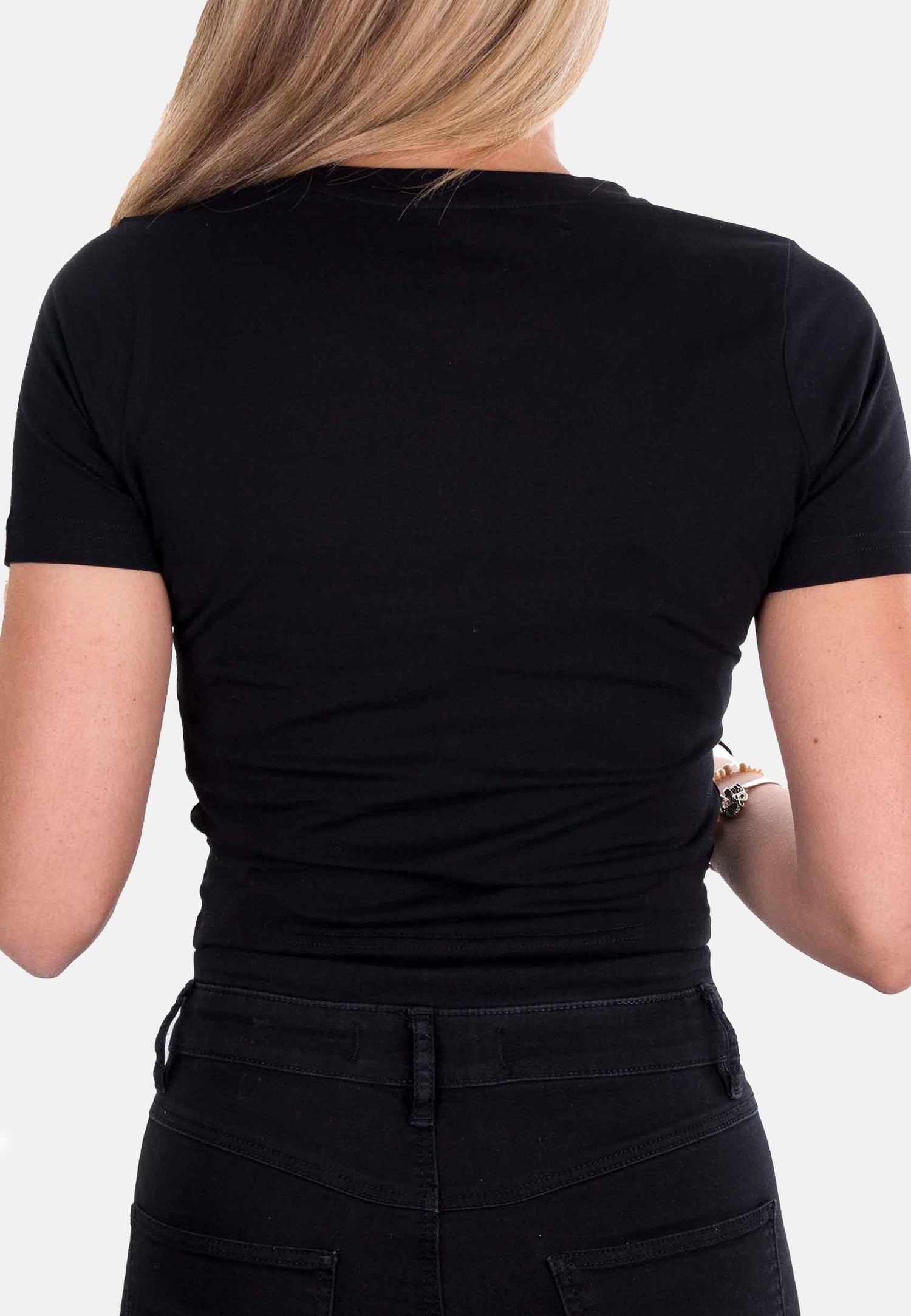 Black striped crop top for women by Pear Juniper, shown from the back with a fitted style and bold pattern.