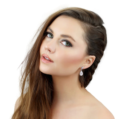 Cyan Ismene crystal teardrop earrings with sparkling clear CZ stones, elegant jewelry accessory for special occasions.