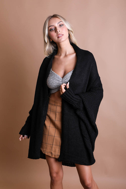 Black knit bat sleeve cardigan by Start2Finish, featuring a cute, cuddly bat design in a one-size fit.
