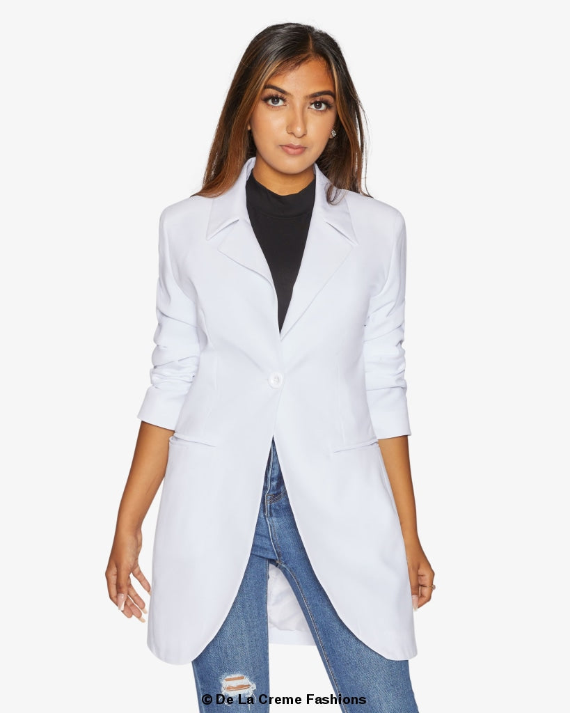Rose Eleusis curved hem longline blazer, stylish jacket with a curved hem and tailored fit, displayed on a neutral background.