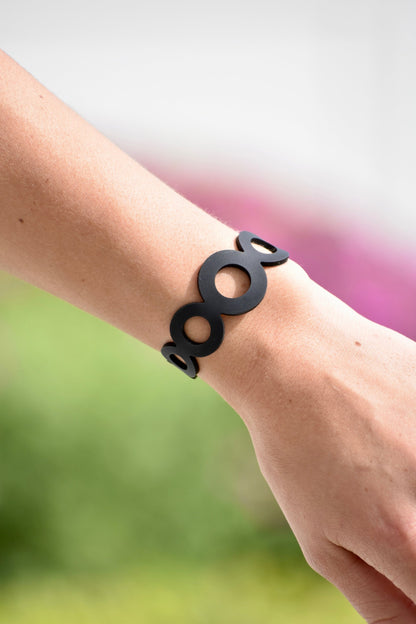 Black Rose Sweet Bracelet featuring a delicate design, jewelry and watches accessory, perfect for stylish wrist adornment.