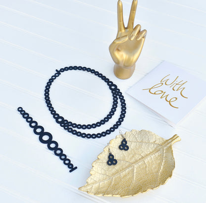 Black Rose Sweet Bracelet featuring colorful beads and a delicate chain, perfect for stylish jewelry and watch accessories.