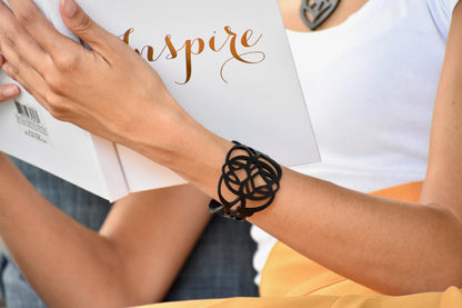 Black Rose Brave bracelet, a stylish jewelry piece featuring a sleek design with intricate details for a modern look.